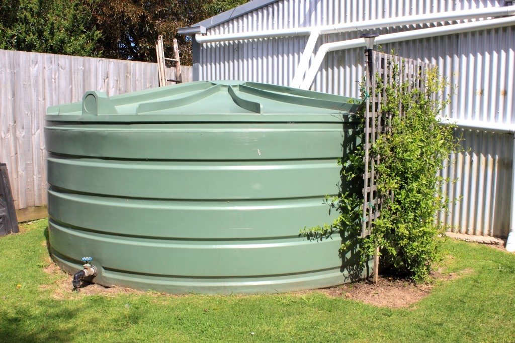 Large green rainwater tank
