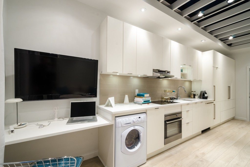 modern kitchen using smart appliances