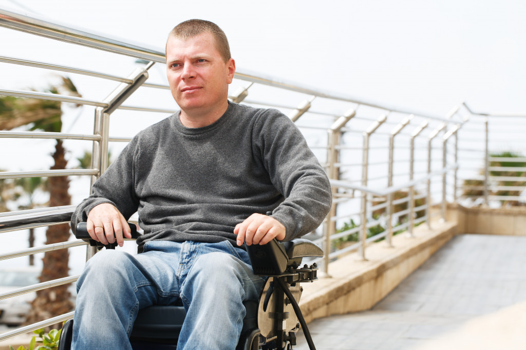 Disabled man near the railing
