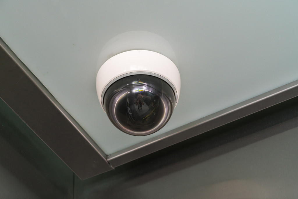 An image of a CCTV camera on a ceiling